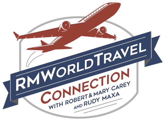 Red airplane flying over blue banner.  Banner text reads RMWorld Travel.